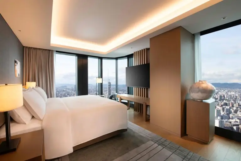 Elegant bedroom in a suite at Conrad Nagoya